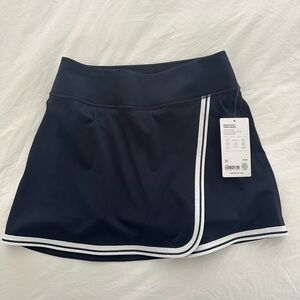 Athleta Navy Crosscourt 14” High Rise Skort with White Trim
